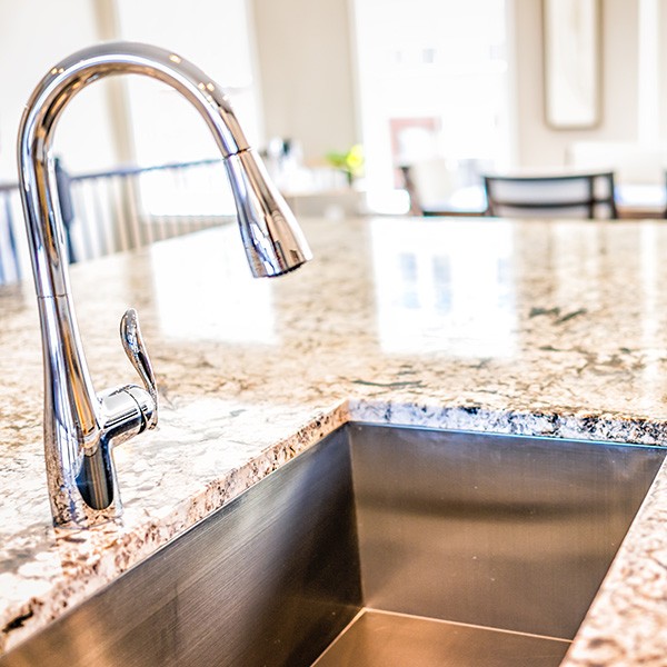 New modern faucet and kitchen room sink | Stonemeyer Granite